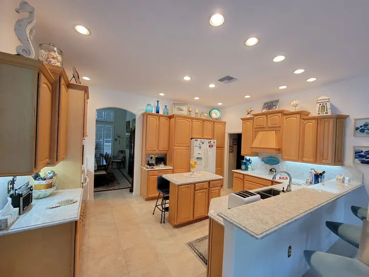 Wide view of a completed Cambria Montgomery quartz kitchen