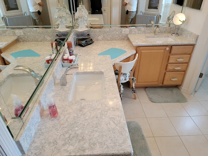 Completed double bathroom vanity with matching countertops