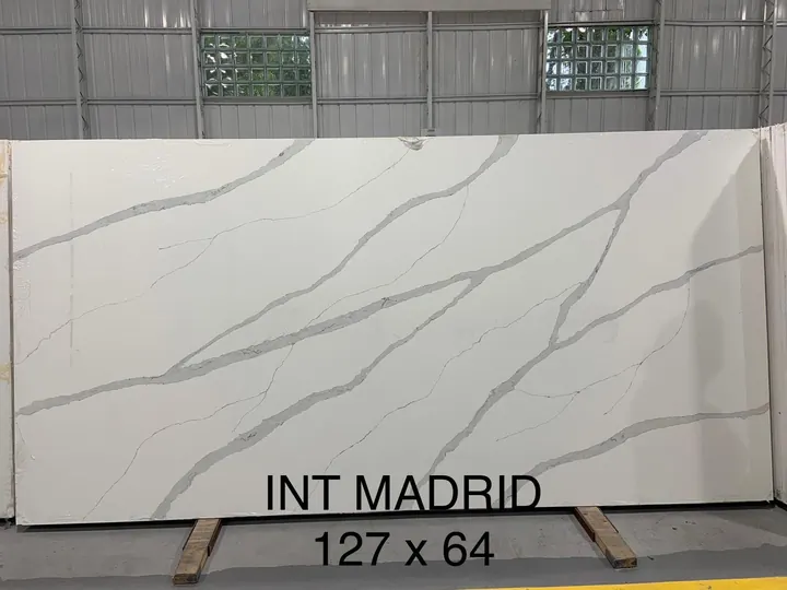 White quartz slab with gray Calacatta-style veining