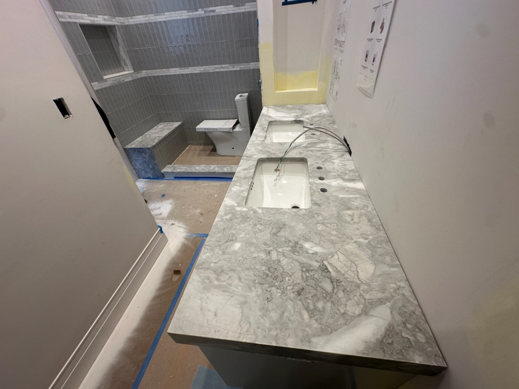 Double-sink stone bathroom vanity in Apollo Beach