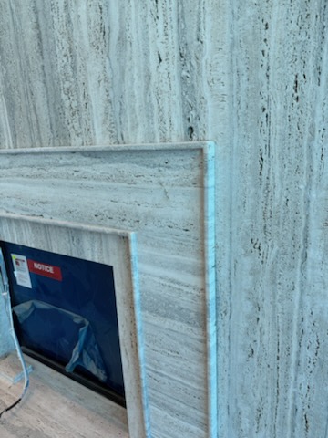 Stone fireplace surround detail in Brandon