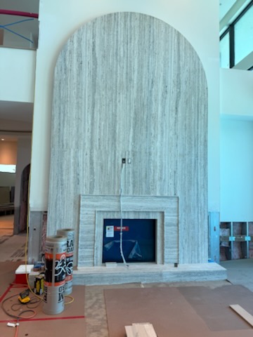 Full-height stone fireplace surround in Brandon