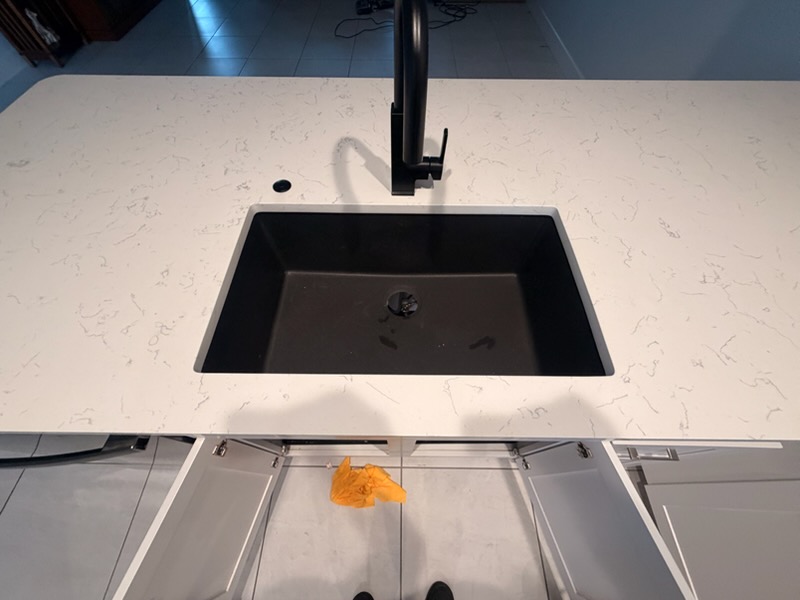 White countertop with black undermount sink in Brandon