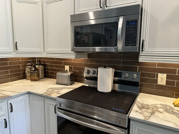 Natural stone kitchen countertops with warm veining