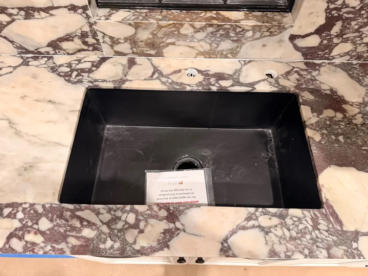 Sink cutout in veined countertop in Riverview