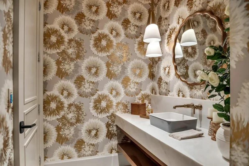 Powder bathroom with white stone vanity