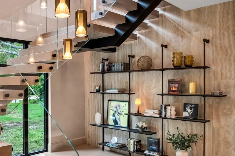 Travertine staircase wall and shelving detail